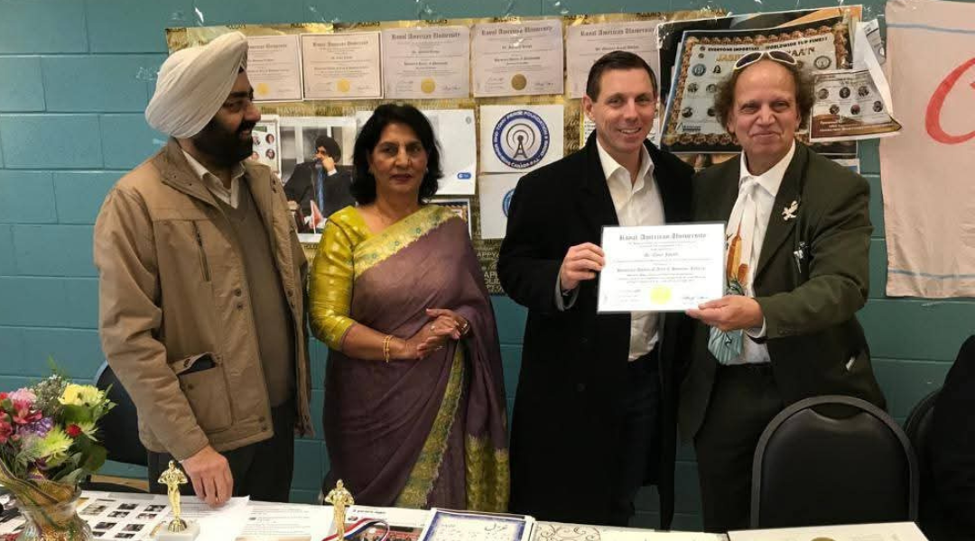Dr J Tony Giving Certificate